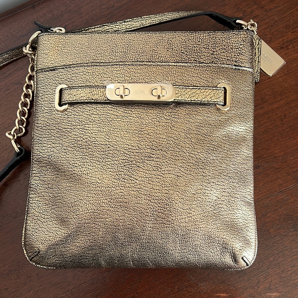 Coach Swagger Swingpack in Gold Metallic Pebble Leather NWOT